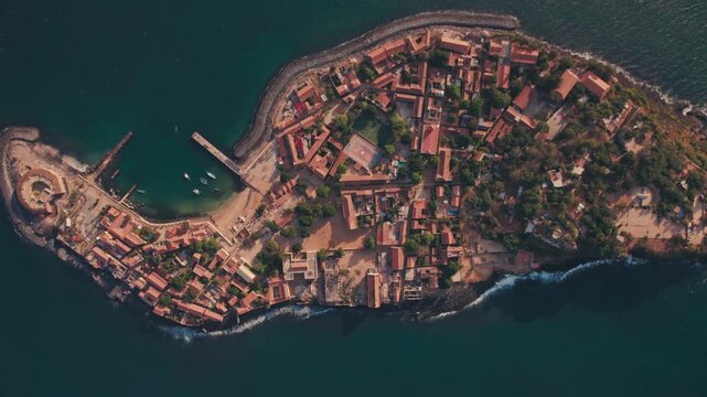Aerial view of Gor&eacute;e Island, a UNESCO World Heritage site, is magical during the day with a magical sunset