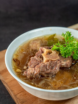Traditional Indonesian Oxtail Soup with Clear Broth and Vegetables