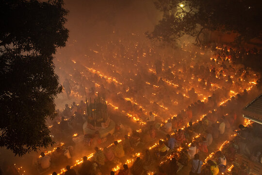 Aerial view of hundreds of candle lights glowing radiantly, creating a mesmerizing spectacle of warmth and light, Narayanganj, Dhaka Division, Bangladesh.