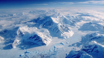 Naklejka premium Majestic snowy mountain landscape with dramatic blue sky and frozen alpine peaks scenic winter nature environment isolated on white background