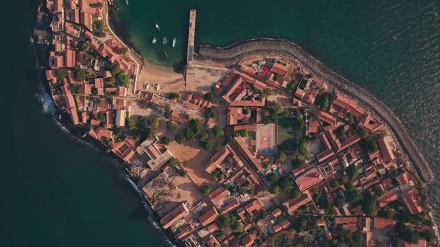 Aerial view of Gor&eacute;e Island, a UNESCO World Heritage site, is magical during the day with a magical sunset