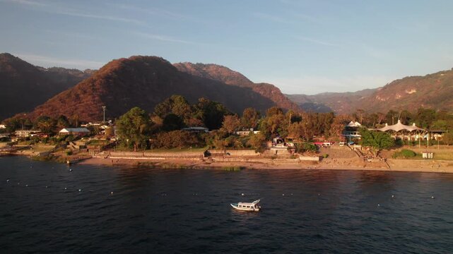 Tour boat on Lake Atitlan, Guatemala, 4K drone shot