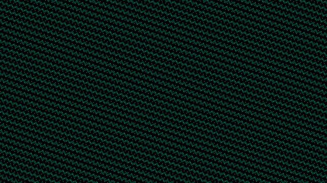 Close-up view of green fabric texture showcasing diagonal weave pattern in a minimalist studio setting