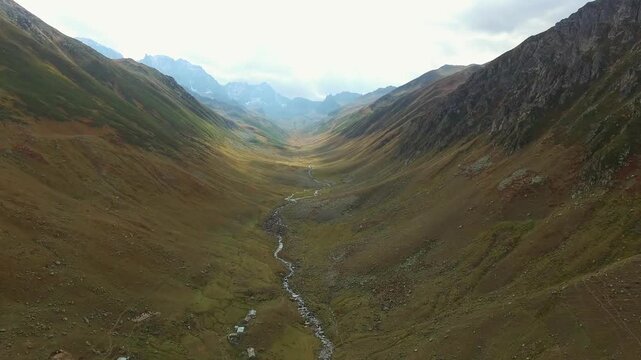 Aerial view of a remote village in Ladakh, Jammu and Kashmir, Asia. Surrounded by arid mountains and dry valleys, the settlement reflects traditional architecture and high-altitude Himalayan culture.