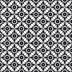 Seamless Black and White Geometric Pattern Featuring Stylized Four-Leaf Clovers and Polka Dots