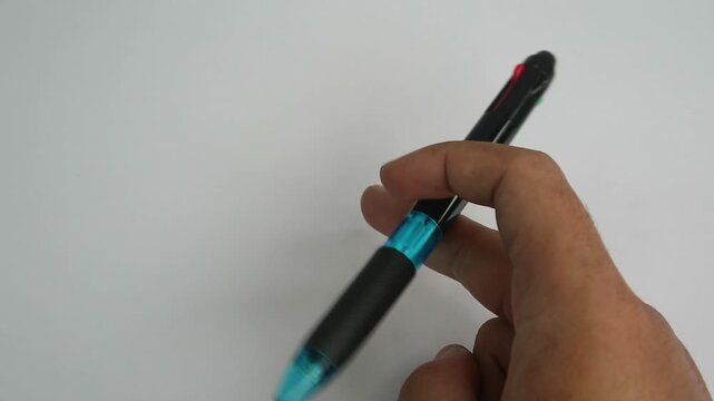 Video Close-Up of Hand Fidgeting with Pen