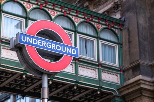  Low angle view of the famous and iconic London Underground tube station sign. This post mounted version is located at Villiers Street near Charing Cross Station.