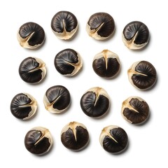 Black Garlic Cloves - A Close-Up of Fermented Garlic Bulbs.