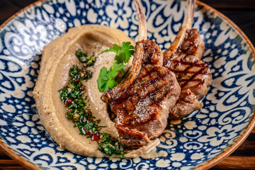 Grilled lamb chop with eggplant puree © zukamilov