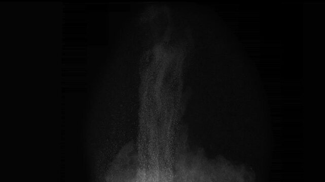 Projectile Impact on the Snow Cover. A column of soil and dust rises into the air from the explosion. Isolated on black. Use in blend modes to simulate a battlefield