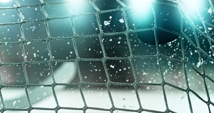 Extreme super slow motion of an ice hockey stick shooting a puck into the goal net at 1000 fps, ice particles bursting on impact with a blurred winter stadium and rink in background.