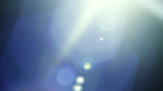 Real lens sunburst flare transition with fast cinematic light streak cuts