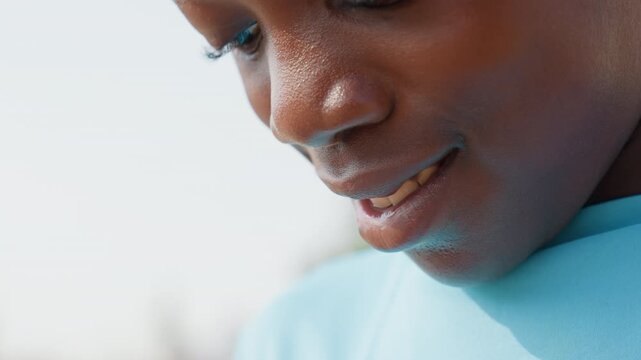 Calm teenage sports player. Quiet moment of resolve for teenage athlete after training session. Teenage sports competitor displays calm determination during reflective pause after practice