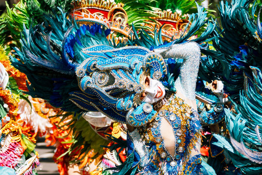 Cebu City, Philippines - 18 January 2026: View of a vibrant Sinulog festival dancer adorned in intricate blue, silver, and gold, a spectacle of cultural celebration.