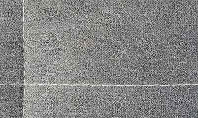 Fototapeta premium Gray carpet texture with intersecting white seams
