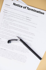 Notice of termination document on office desk, official HR paper announcing job dismissal or contract ending, symbol of decision, change, and professional transition.