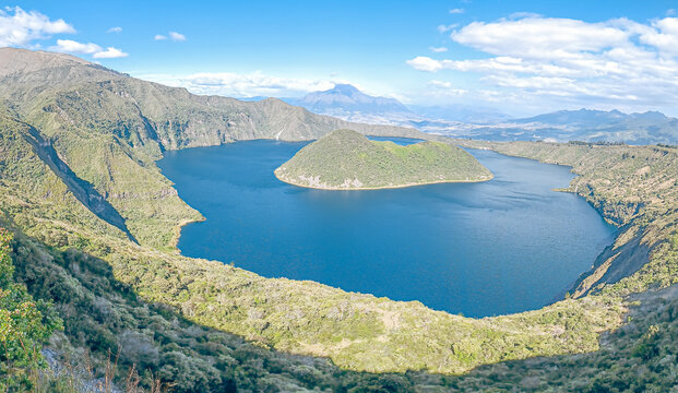 Cotacachi, Ecuador - November 5, 2025: Cuicocha Lagoon is a crater lake at the foot of the Cotacachi Volcano. Its deep blue waters and volcanic islets create a stunning natural landscape.