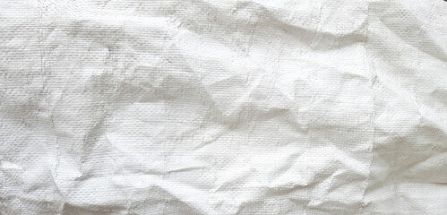 Fototapeta premium Background. Texture of crumpled white burlap. Copy space.