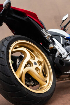 Honda CB1000R low angle rear wheel low wide angle shot, Streetfighter motorbike parked on ground