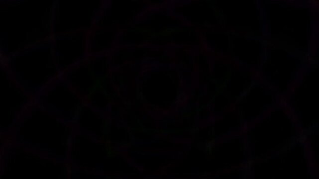 Neon glowing colorful spiral circles tunnel on black background with white empty space for tech or futuristic design use