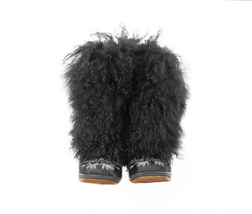 Black long fur boots isolated on white background