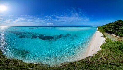 Obraz premium stunning seaside panorama with clear blue water and sky