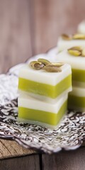 Pistachio jelly sweet dessert squares with nuts