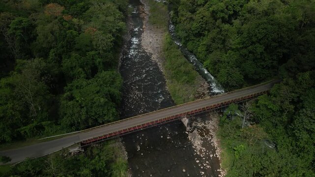 Aerial of bridge over River Rio Barranca in Costa Rica on Route 702 in jungle
