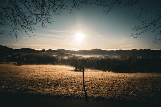 Sunrise over misty hills and fields, tranquil atmosphere, spring, hiking in the Sauerland region, the Briloner Kammweg trail from 59929 Brilon to 34508 Willingen (Upland), Germany
