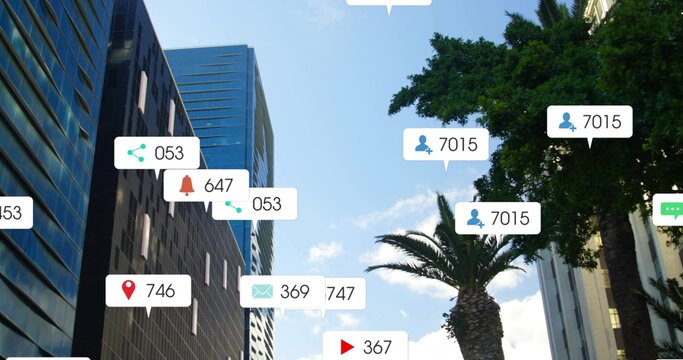 Overlaying white notification bubbles with icons and number badges hovering over downtown canyon