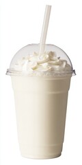 Vanilla milkshake with whipped cream and straw in disposable cup