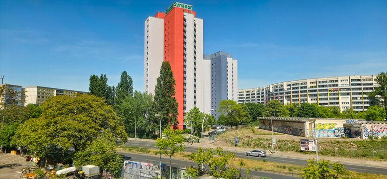 Urban landscape featuring modern buildings and lush greenery in city