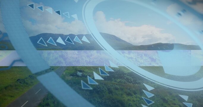 Displaying pale blue circular HUD overlay centered on rural road, showing rings and chevrons