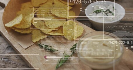 Displaying wooden board with tortilla chips, two creamy dips, parchment, napkin, HUD overlays © vectorfusionart