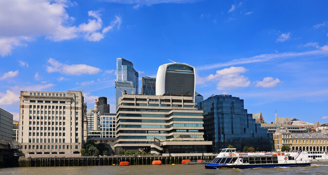 LONDON UNITED KINGDOM: Architecture details of Modern Building Glass facade. Business background high rise building skyscrapers, industrial architecture.