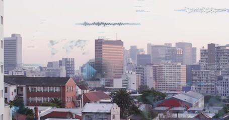 Naklejka premium Highlighting reddish brown office tower catching warm light over rooftops, digital overlays