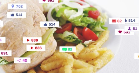 Showing white plate with sandwich, crinkle fries and salad on white tabletop, with social badges © vectorfusionart