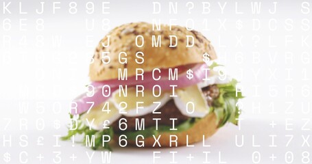 Showing gourmet burger sitting in studio with seeded bun, cheese, lettuce, beef patty, text overlay
