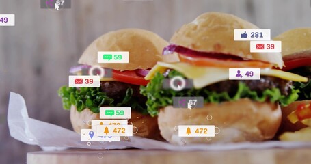 Displaying three sliders with lettuce, tomato and cheese on wooden board, with digital badges © vectorfusionart