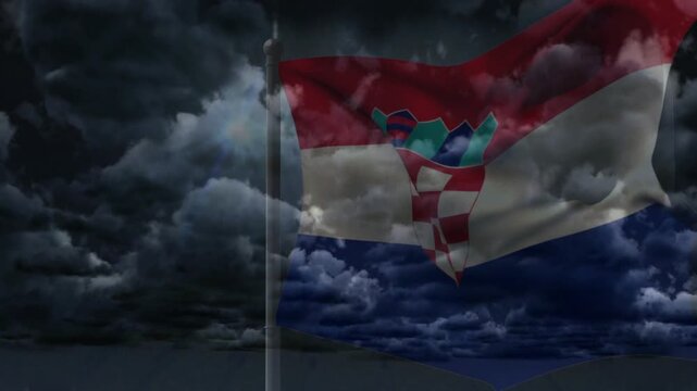 Tricolor semi-transparent flag rippling from pole, gusts growing then easing to show storm motion