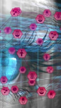 Vertical video: Eyelid lifting eye showing while pink nodes moving and cyan code showing for ID