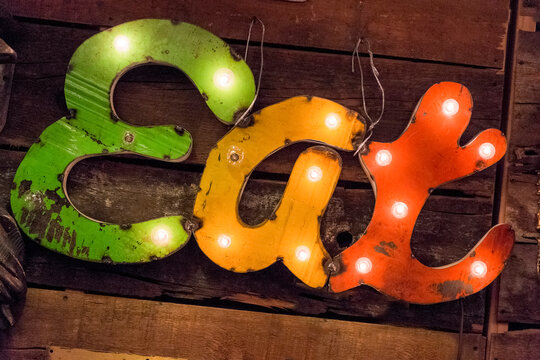 New York City, New York, USA Antique sign - metal letters spelling the word EAT 