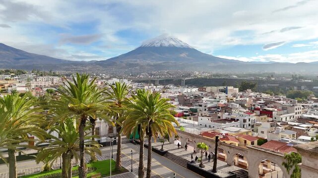 
Aerial view of Yanahuara Square and Portales with the snow-capped Misti volcano during the rainy season in Arequipa, Peru
