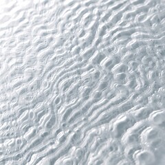 Obraz premium The image is of water droplets on a surface