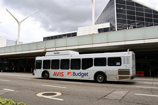 Los Angeles, California &ndash; November 20, 2025: Shuttle bus to AVIS, BUDGET and PAYLESS Rent a Car at LAX Los Angeles International Airport