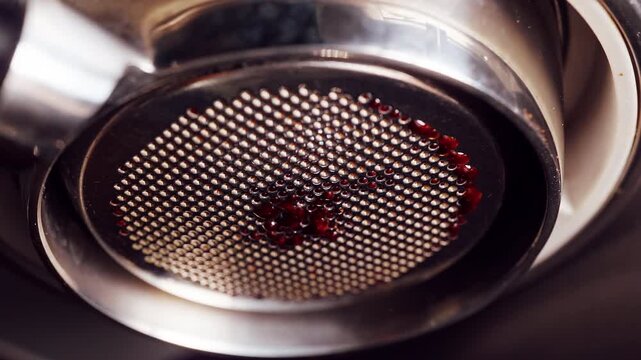 Bottomless portafilter leaking espresso under excessive pressure, close up view of uneven extraction caused by incorrect coffee grind, slow motion coffee brewing failure
