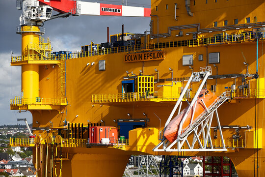 HAUGESUND, NORWAY - May 28, 2025: DolWin Epsilon Offshore HVDC Converter Platform with Liebherr Crane and Lifeboat, Renewable Energy Infrastructure