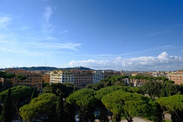 Fototapeta premium Panoramic view of European cityscape with colorful buildings and blue sky