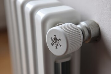 Snowflake icon on white radiator temperature control