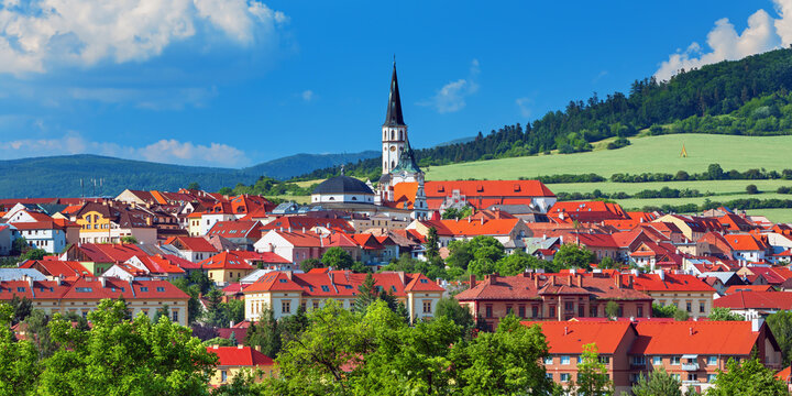 Levoča Panoramic view of Levoča, Slovakia featuring the medieval old town, historic rooftops, and the iconic St. James Church tower. Scenic European cityscape surrounded by nature under beautiful weat